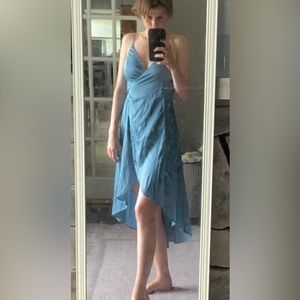 This dress ties in the back, super cute to wear to a wedding or date night.